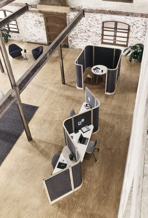 An open plan office with break out areas for focusing